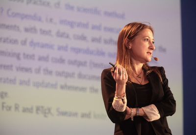 Image of Sandrine Dudoit on stage talking