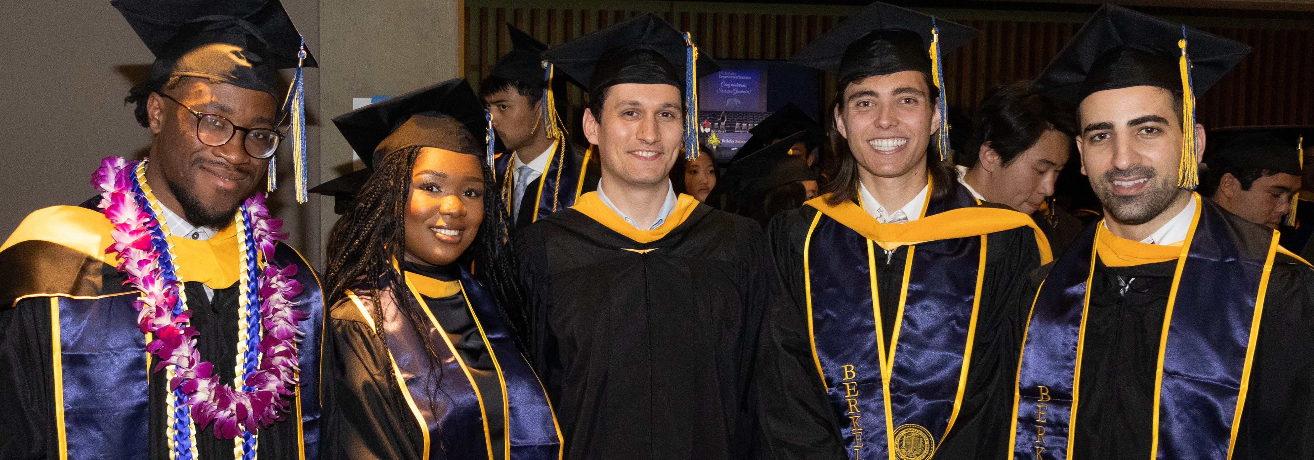 A group of 5 MA Statistics students at commencement