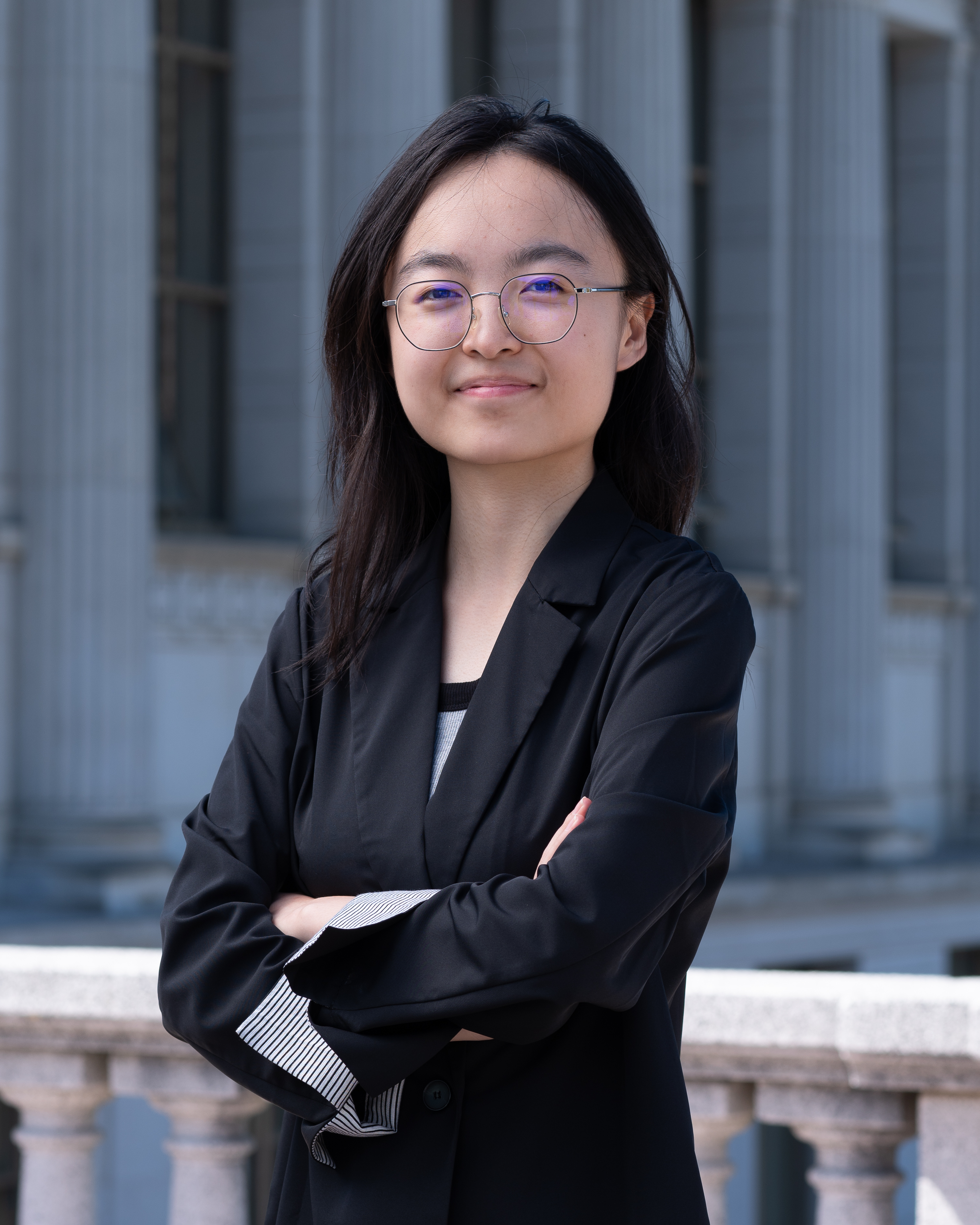 A professional headshot of Ruiwen Liu