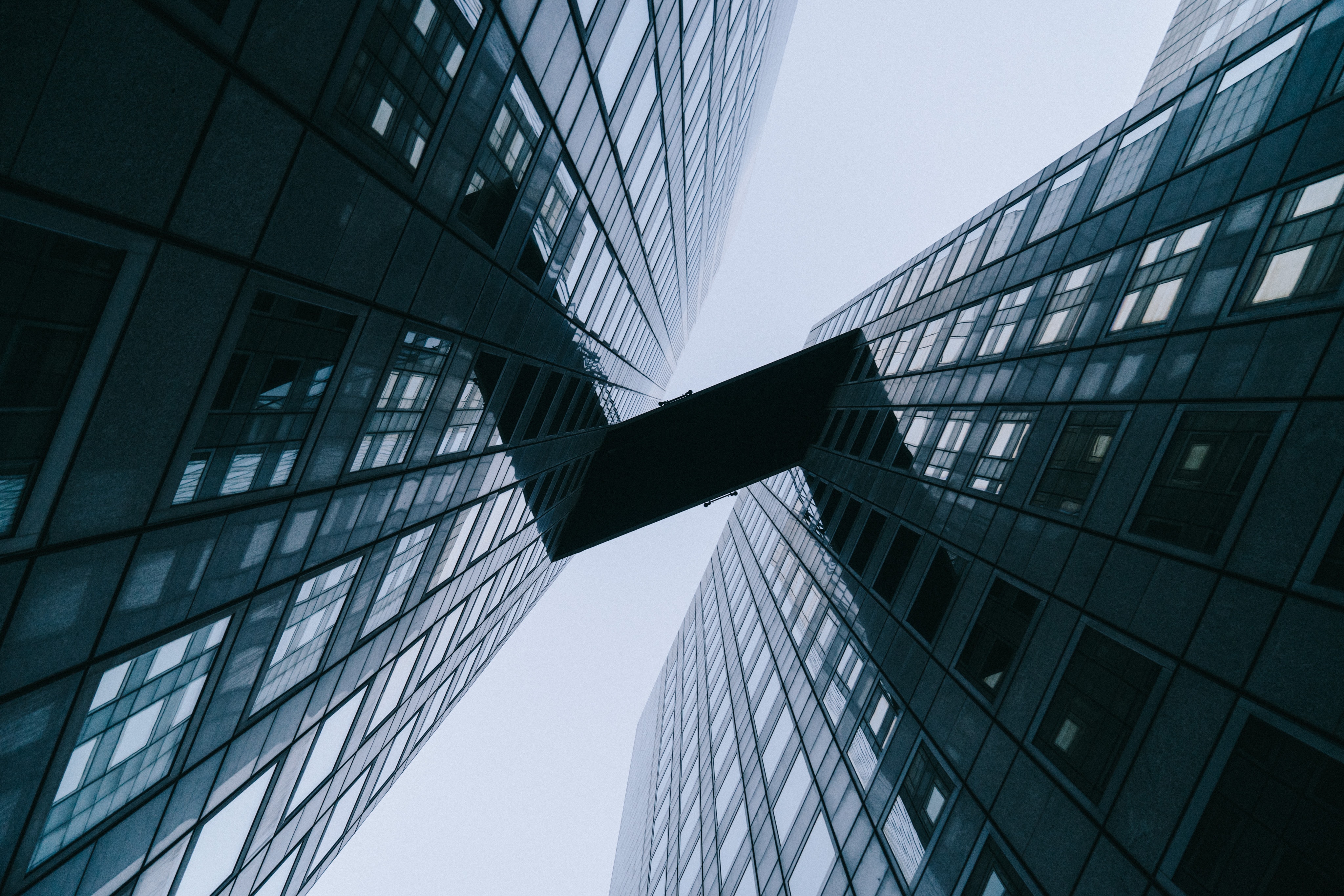 bridge between buildings photo by John Towner